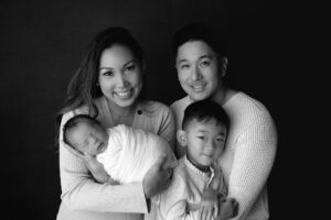 black and white newborn family portrait